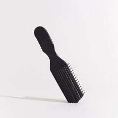 Brush With The Best detangler brush with a wide handle for comfortable grip.