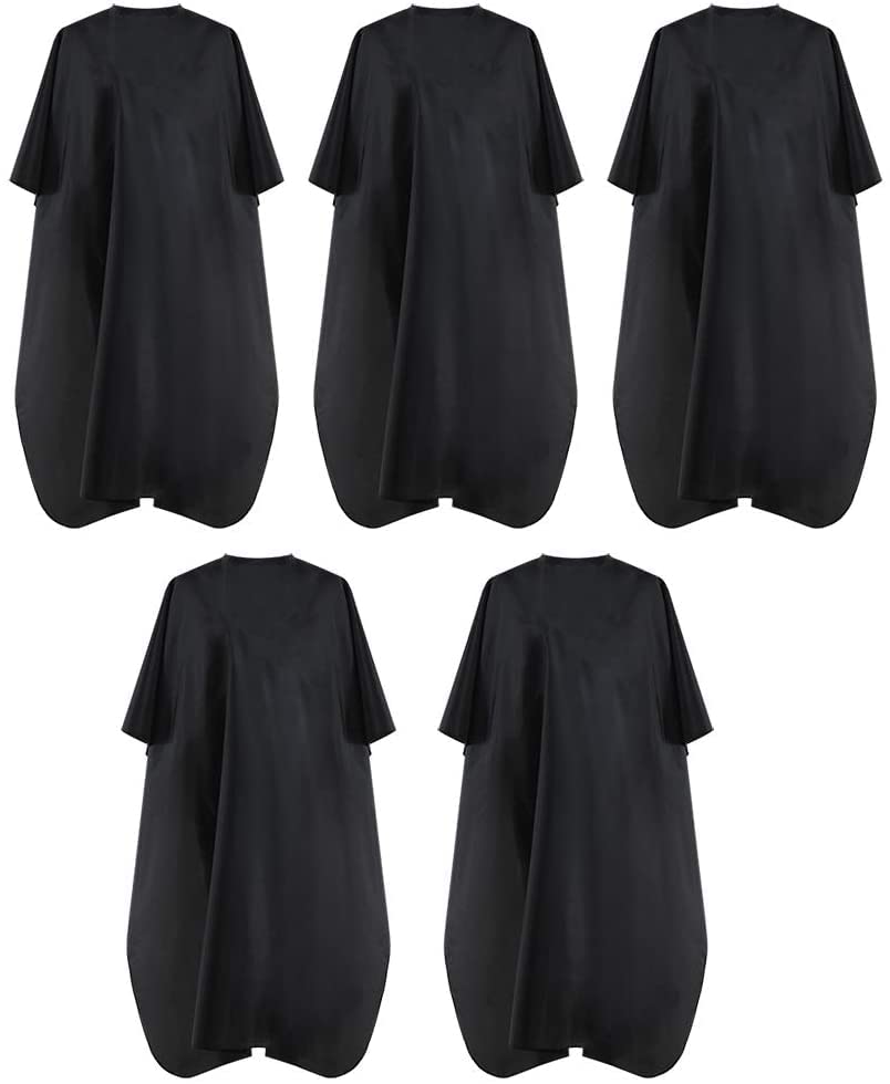 BSFHH black waterproof cape with metal snap closure in a salon setting.