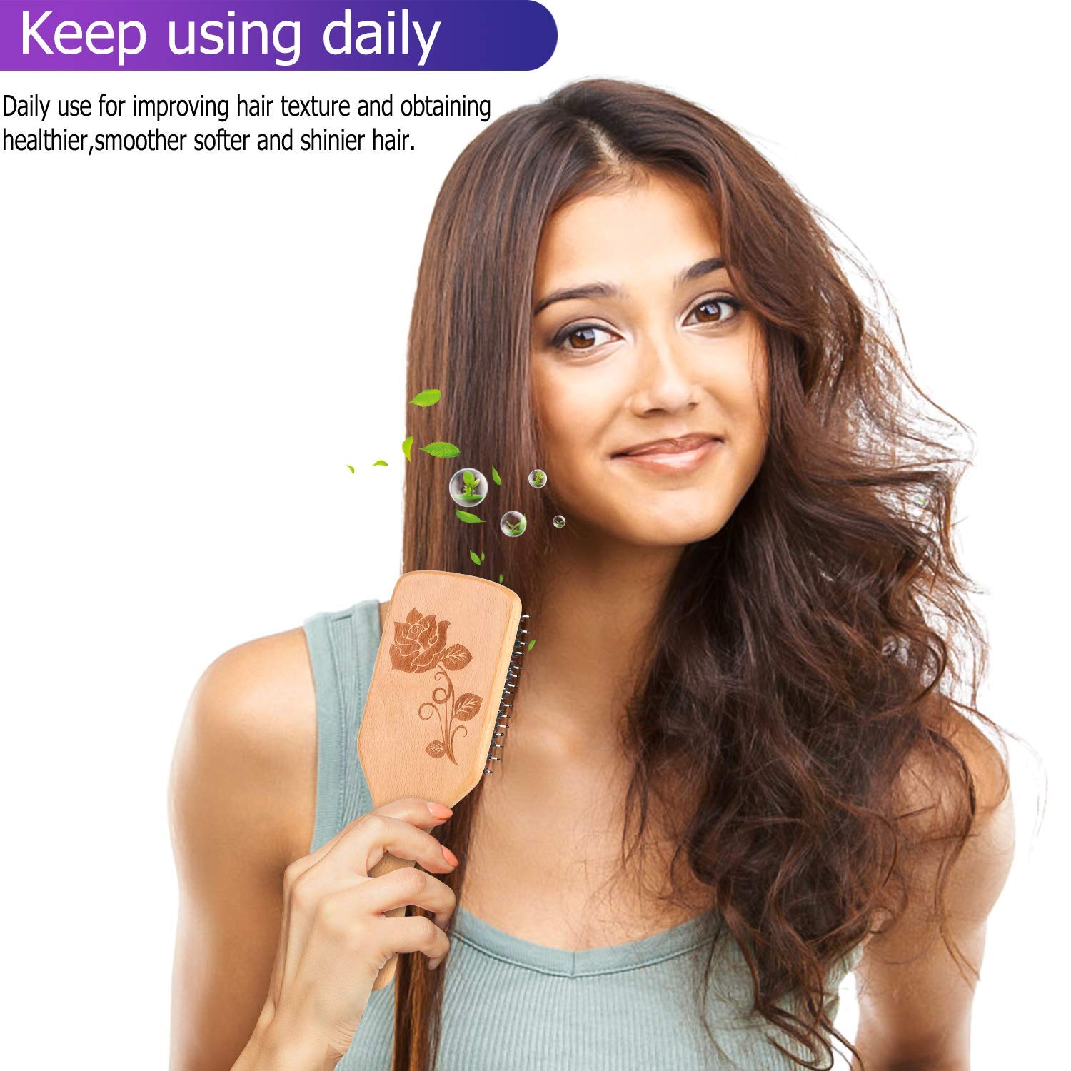 Bsisme hair brush with boar bristles distributes natural oils for shine.