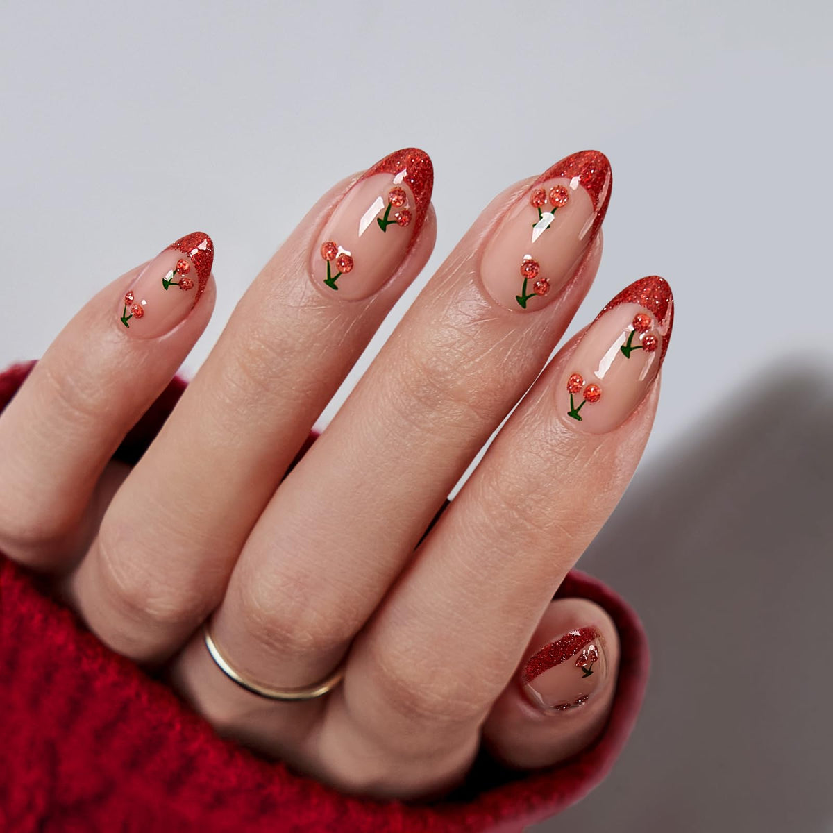 BTArtbox French tip almond nails with red cherry design for a chic salon look.