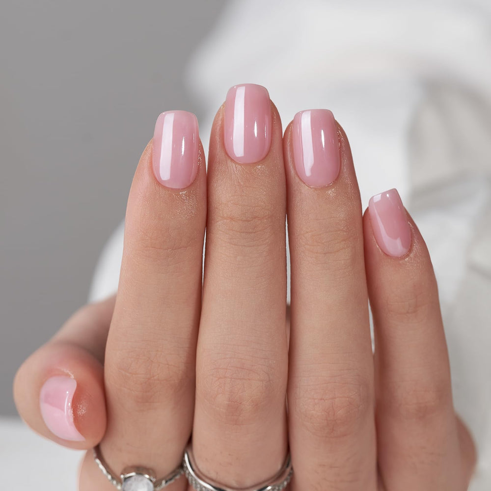 BTArtbox Detalle de uñas adheribles con gel suave y brillo rosa cromado.