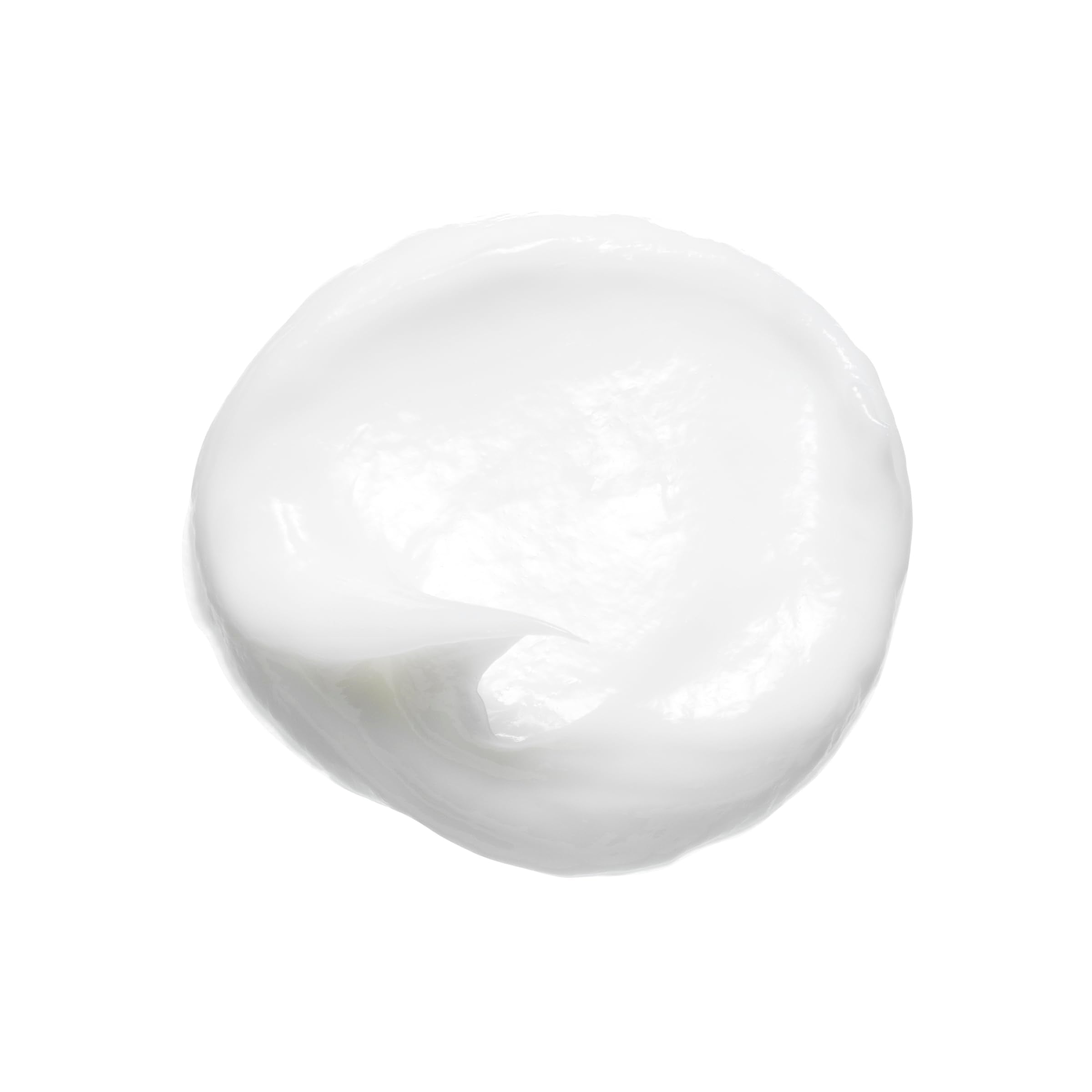 Bumble and bumble curl conditioner on damp hair during application.