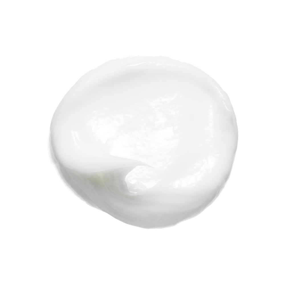 Bumble and bumble curl conditioner on damp hair during application.