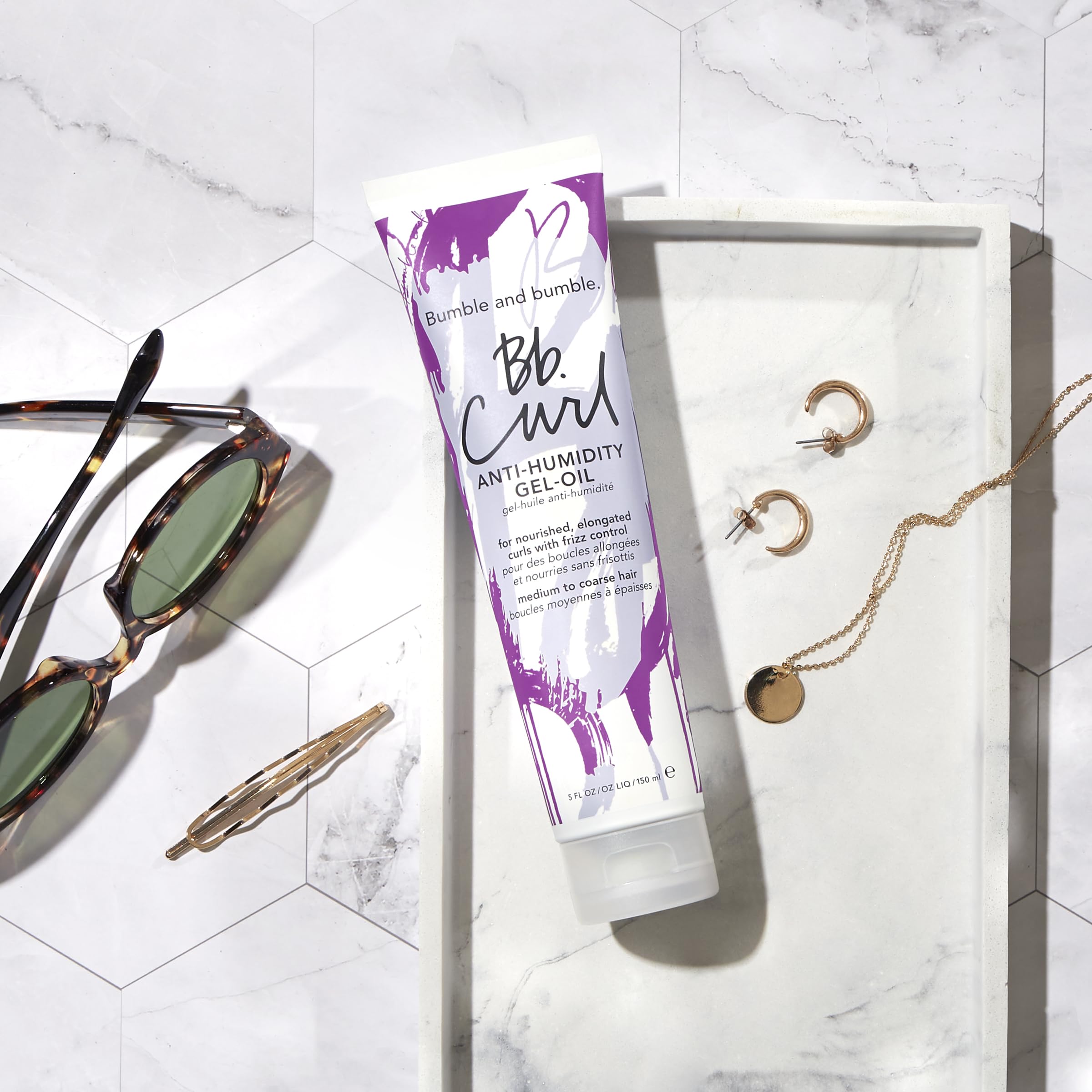 Bumble and bumble Curl Anti-Humidity Gel-Oil fragrance notes: grapefruit and lemon.