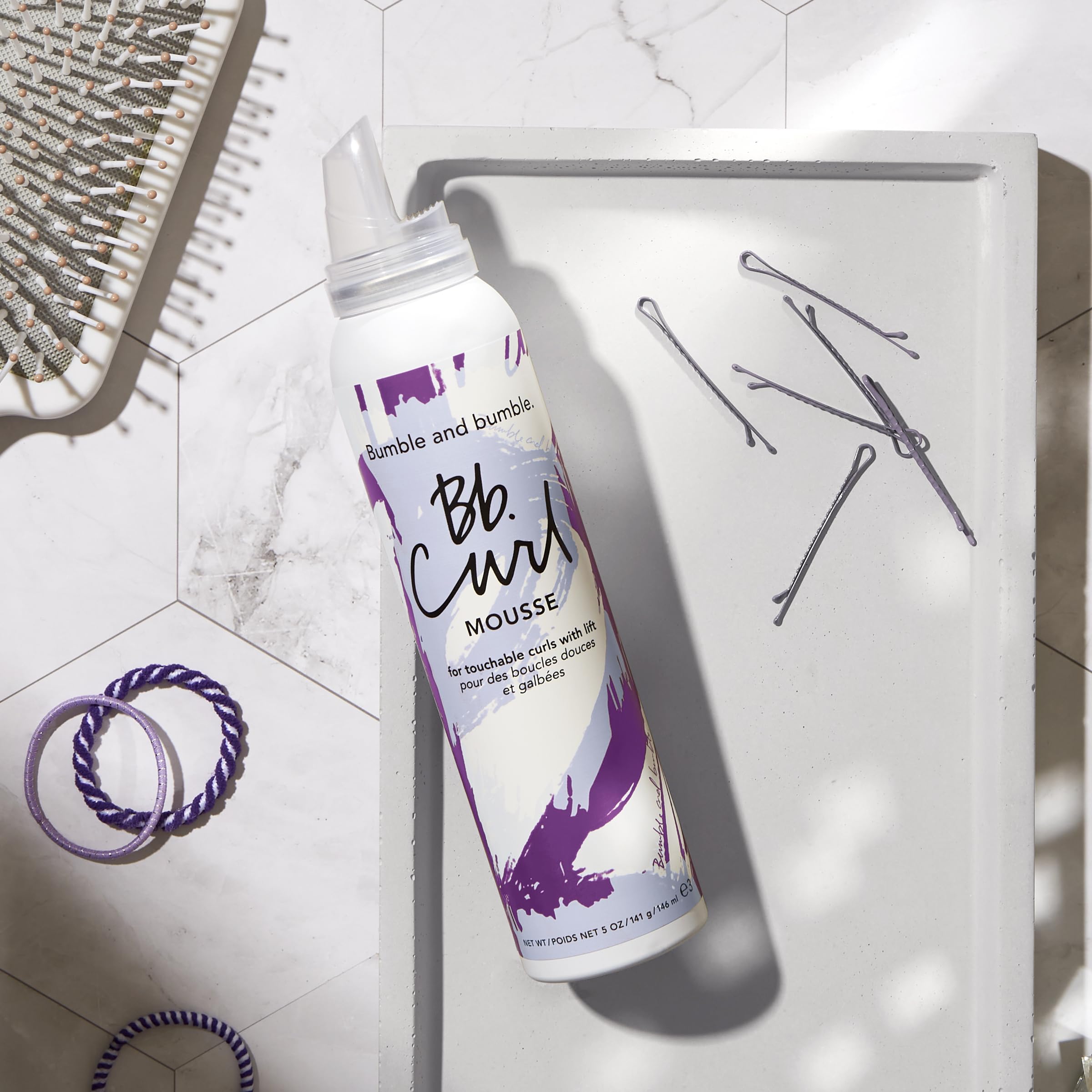Bumble and bumble Curl Defining Mousse helps reduce frizz in humidity