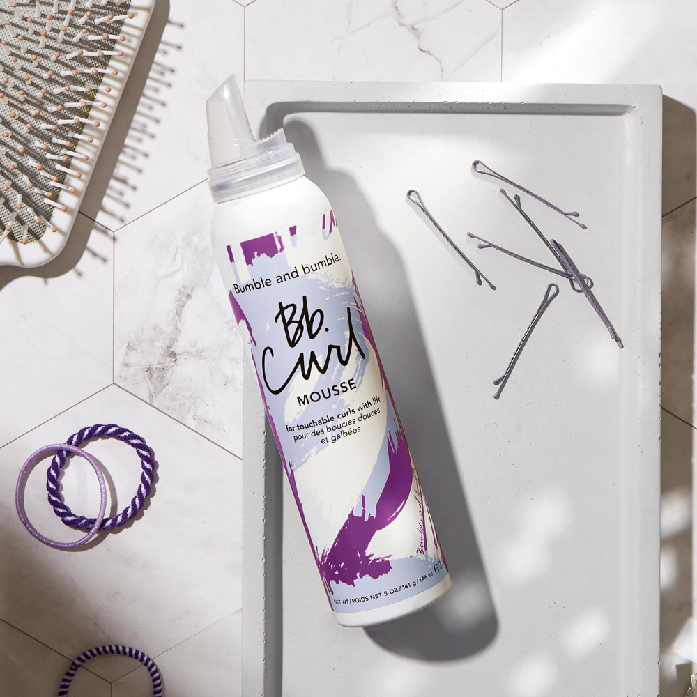 Bumble and bumble Curl Defining Mousse helps reduce frizz in humidity
