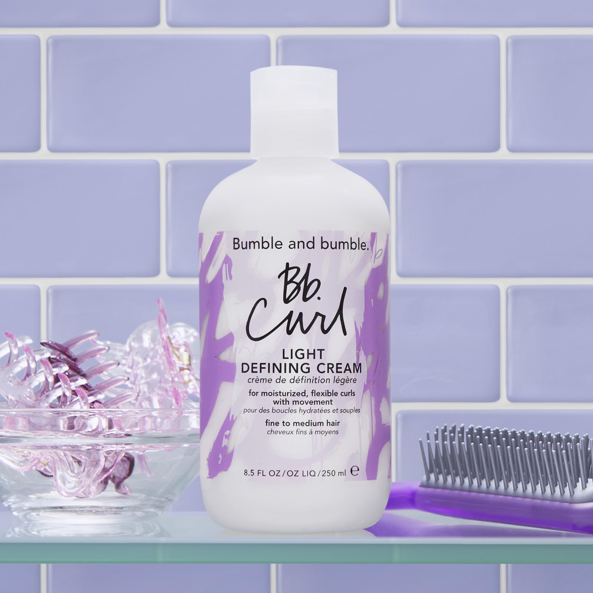 Bumble and bumble Curl Light Defining Styling Cream closeup with shine