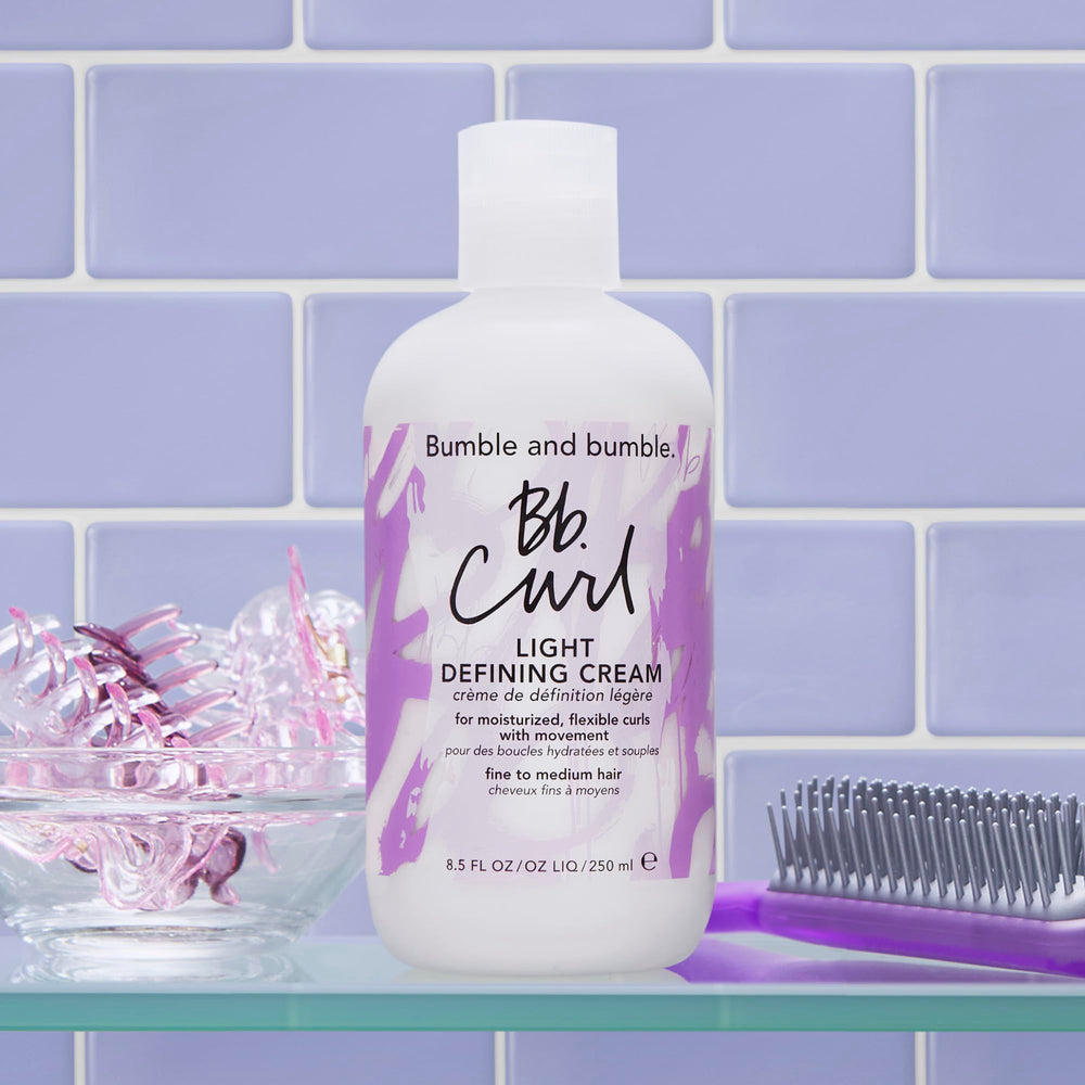 Bumble and bumble Curl Light Defining Styling Cream closeup with shine