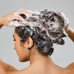 Bumble and bumble Gentle Hydrating Shampoo creamy lather on hair for moisture