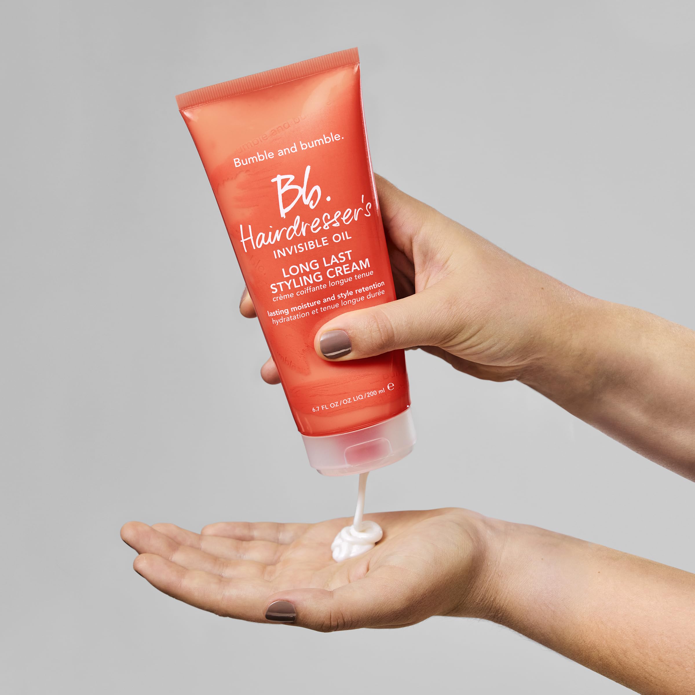 Bottle illustrating humidity protection for lasting style.