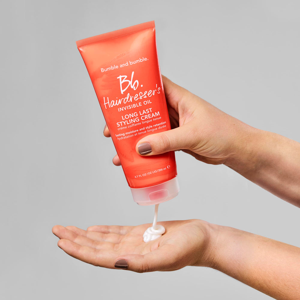 Bottle illustrating humidity protection for lasting style.
