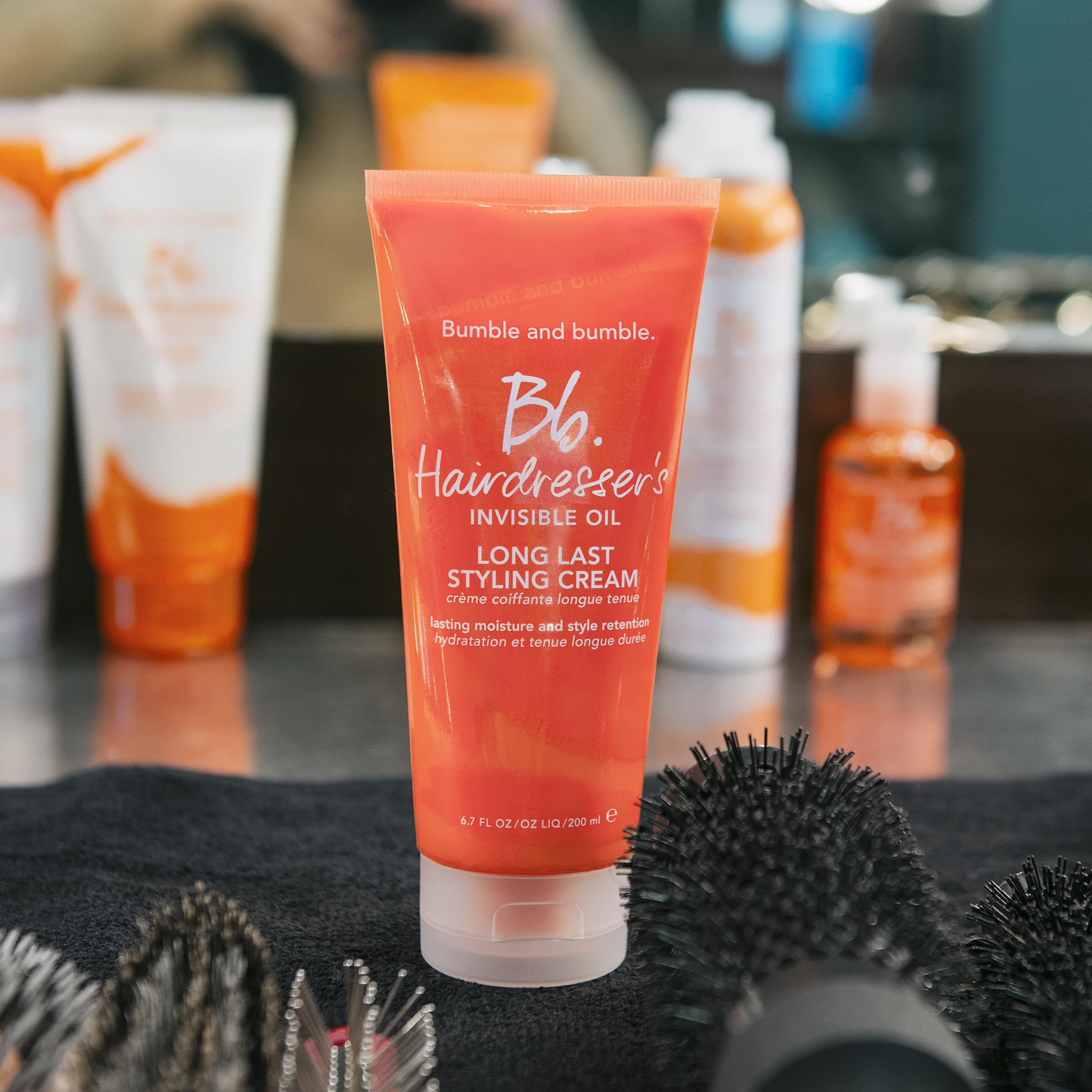 Sleek, non-greasy finish achieved with Bumble and bumble styling cream.