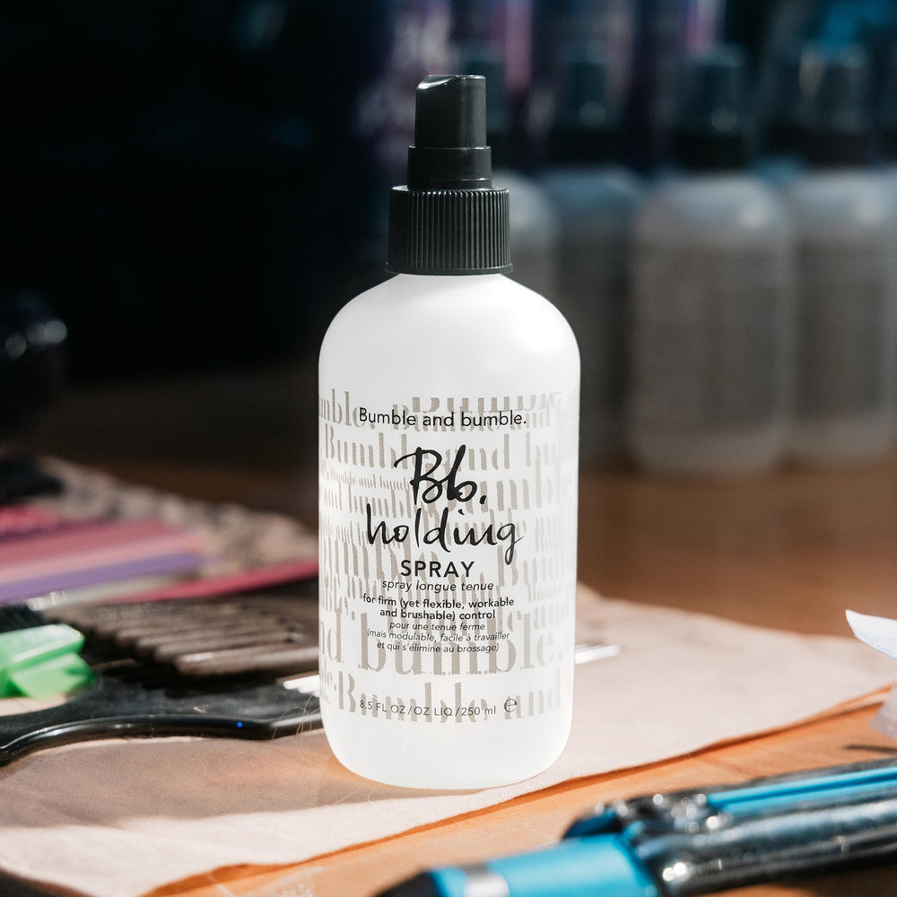 Bumble and bumble hairspray packaging on shelf communicates premium hold and versatility.