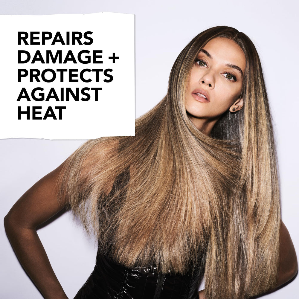 Bumble and bumble Heat Shield mist spray action for quick styling.