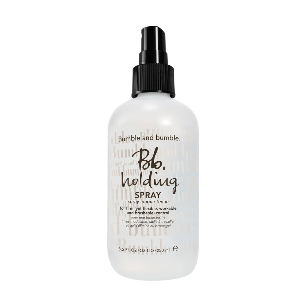 Bumble and bumble holding hairspray bottle demonstrates firm, brushable hold for all hair types.