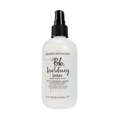 Bumble and bumble holding hairspray bottle demonstrates firm, brushable hold for all hair types.