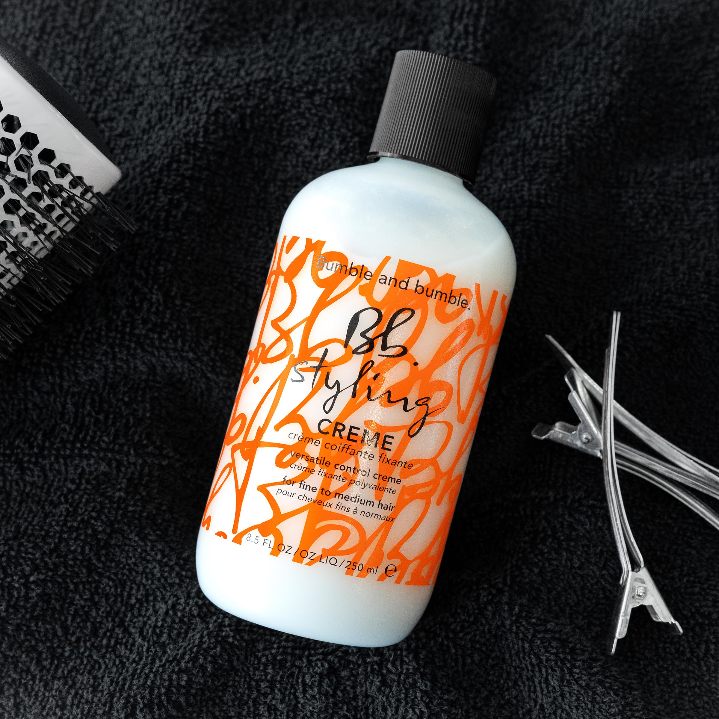 Sleek, polished look enabled by Bumble and bumble Styling Cream.