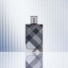 Burberry Brit for Him bottle close up cap showing premium design for gifting.
