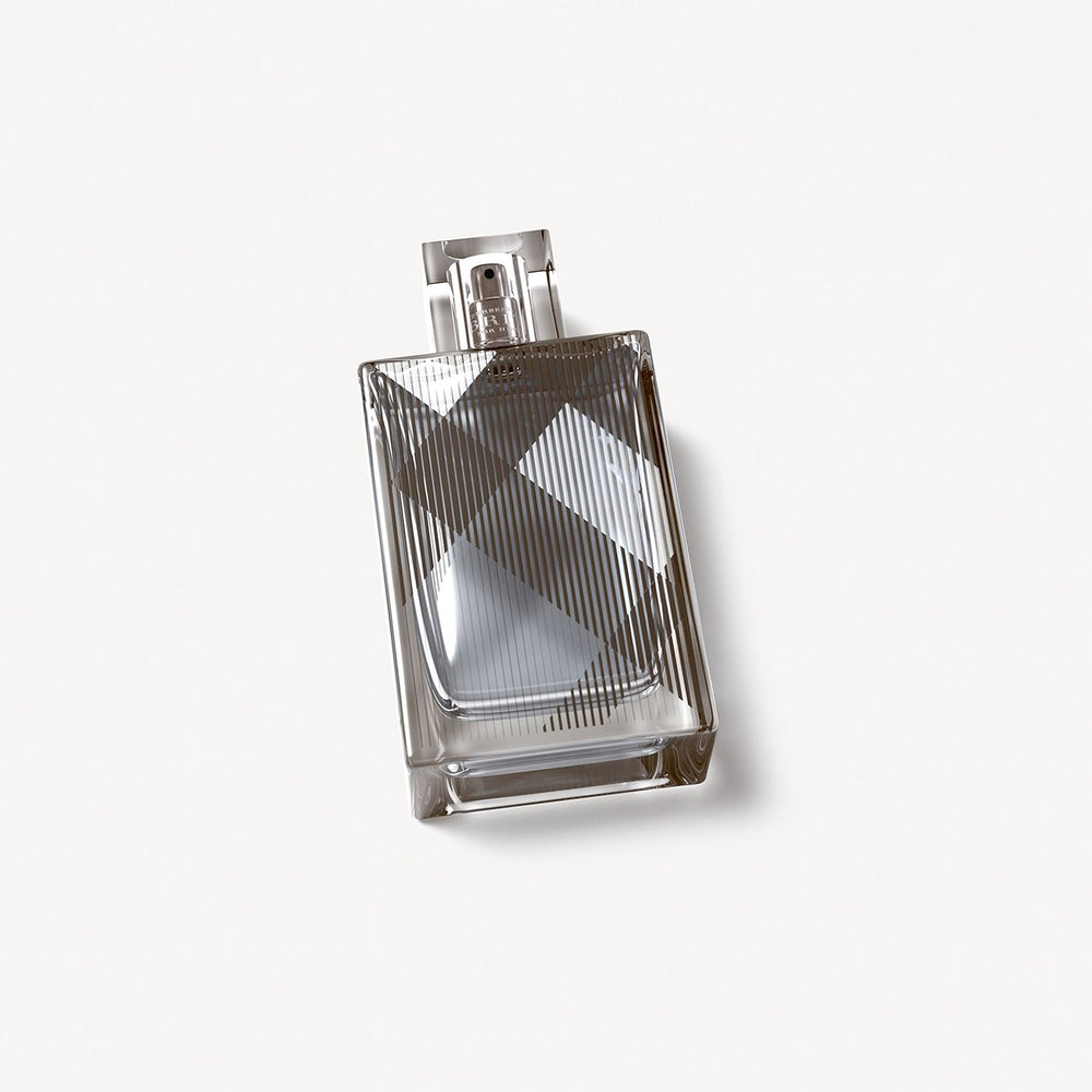 Burberry Brit for Him embossed Brit check on glass bottle.