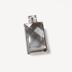 Burberry Brit for Him embossed Brit check on glass bottle.