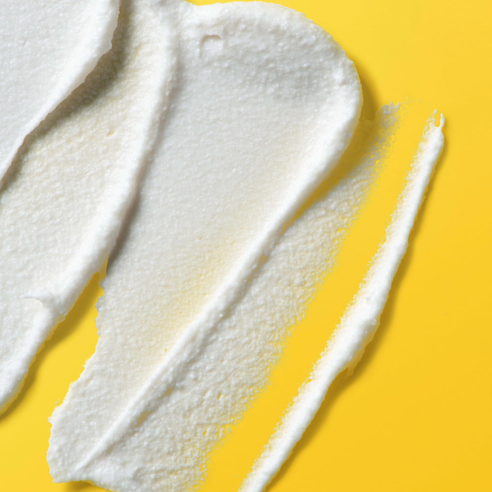 Burt's Bees applying hand cream on dry hands demonstrates daily hydration and soft touch.