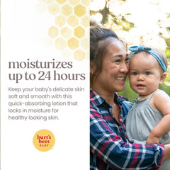 Hand applying Burt's Bees Baby Ultra Gentle Lotion to baby's soft skin.