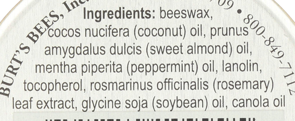 Close-up of Burt's Bees lip balm tin contents showing balm texture.