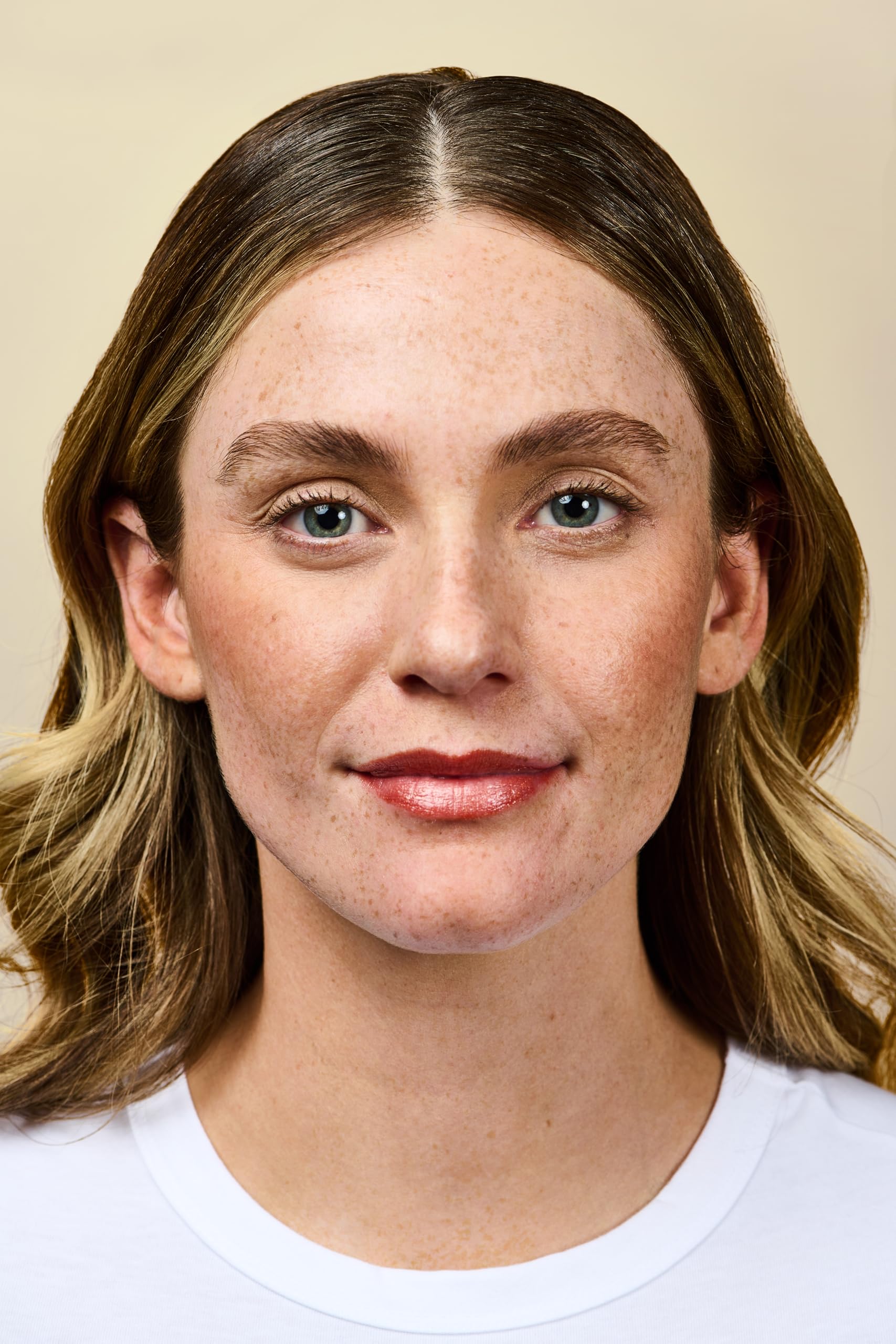 Burt's Bees Lip Shimmer texture image captures luminous shimmer and lightweight feel.