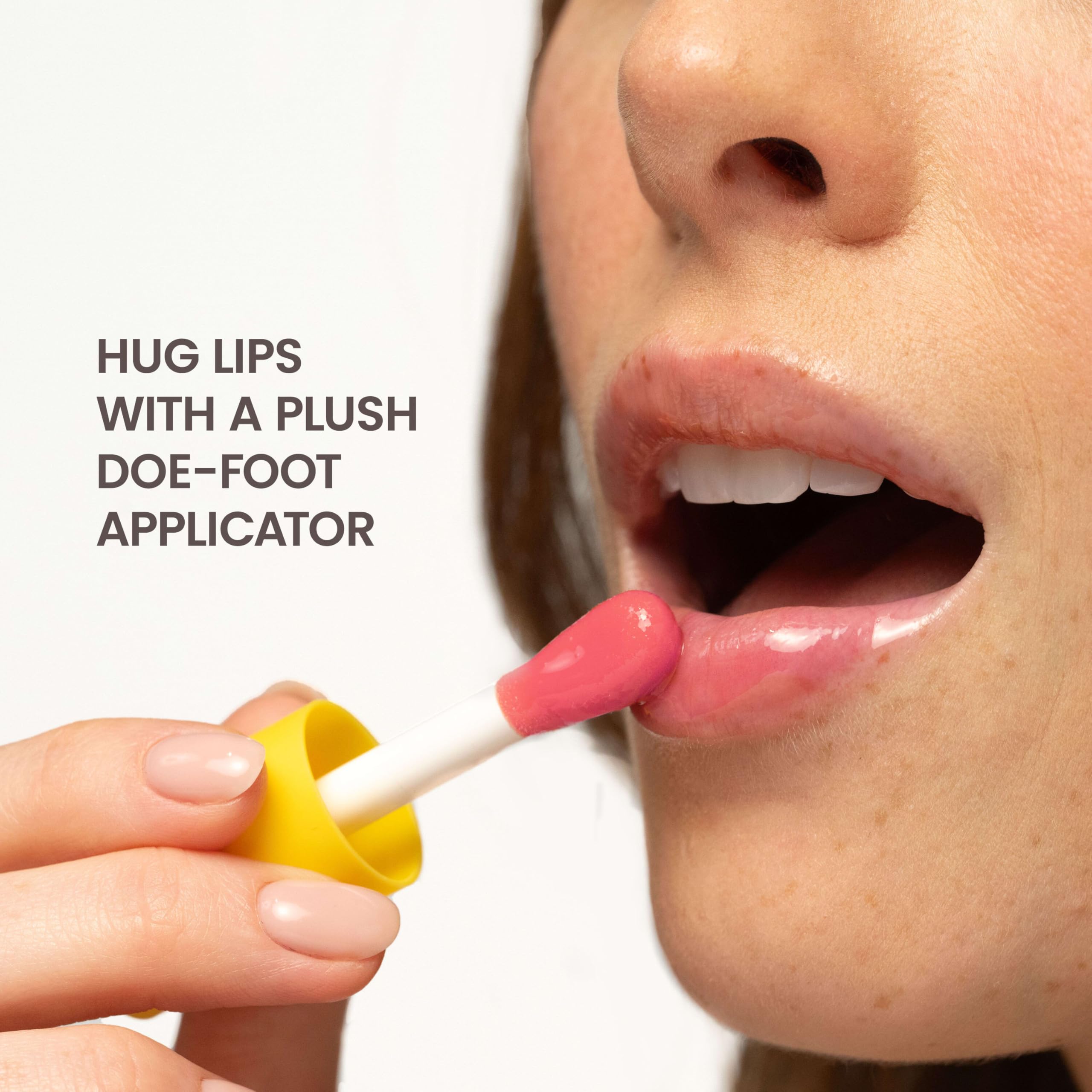 Burt's Bees Lip Oil Pink Sky jojoba oil ingredient close-up.
