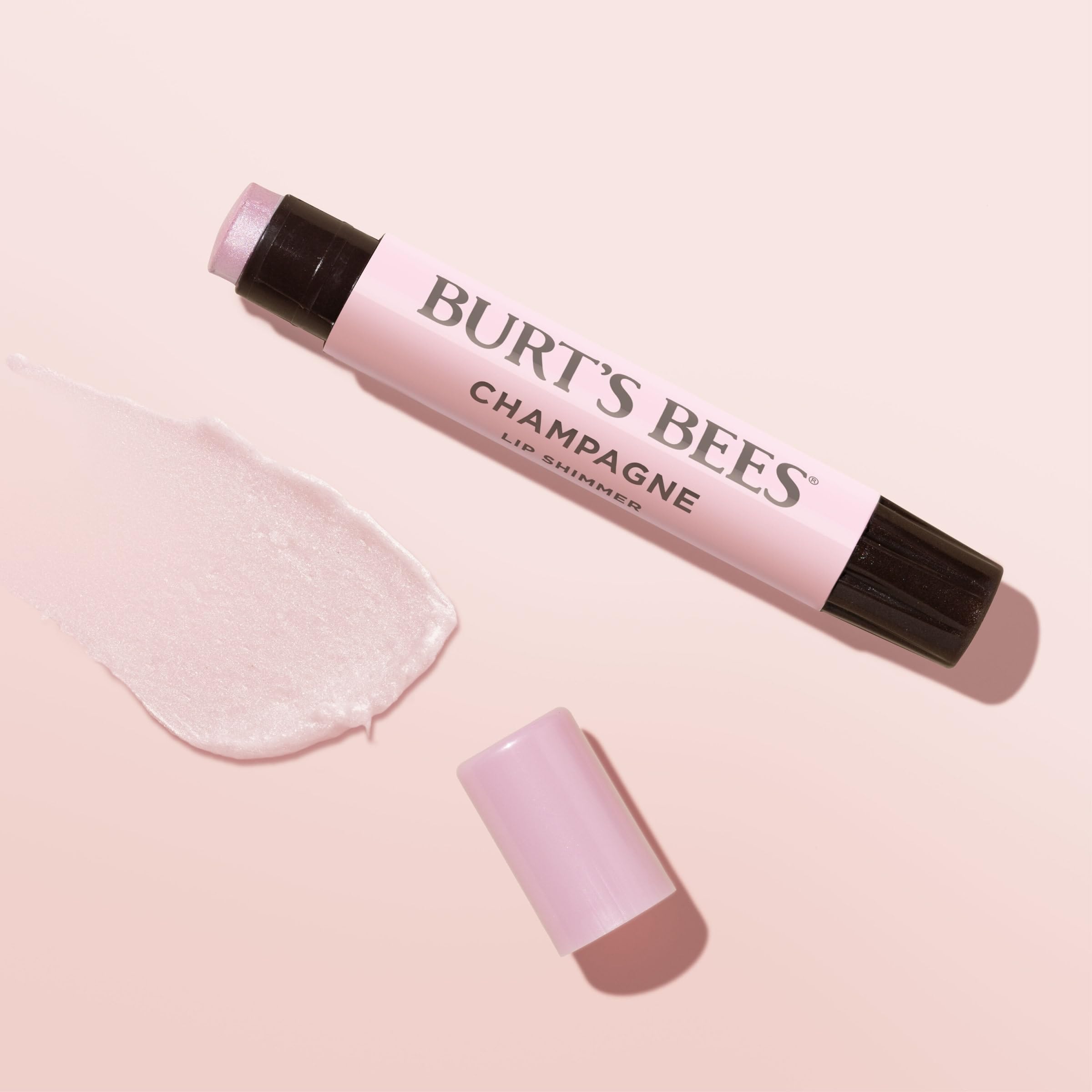 Burt's Bees Lip Shimmer Champagne finish adds luminous glow.