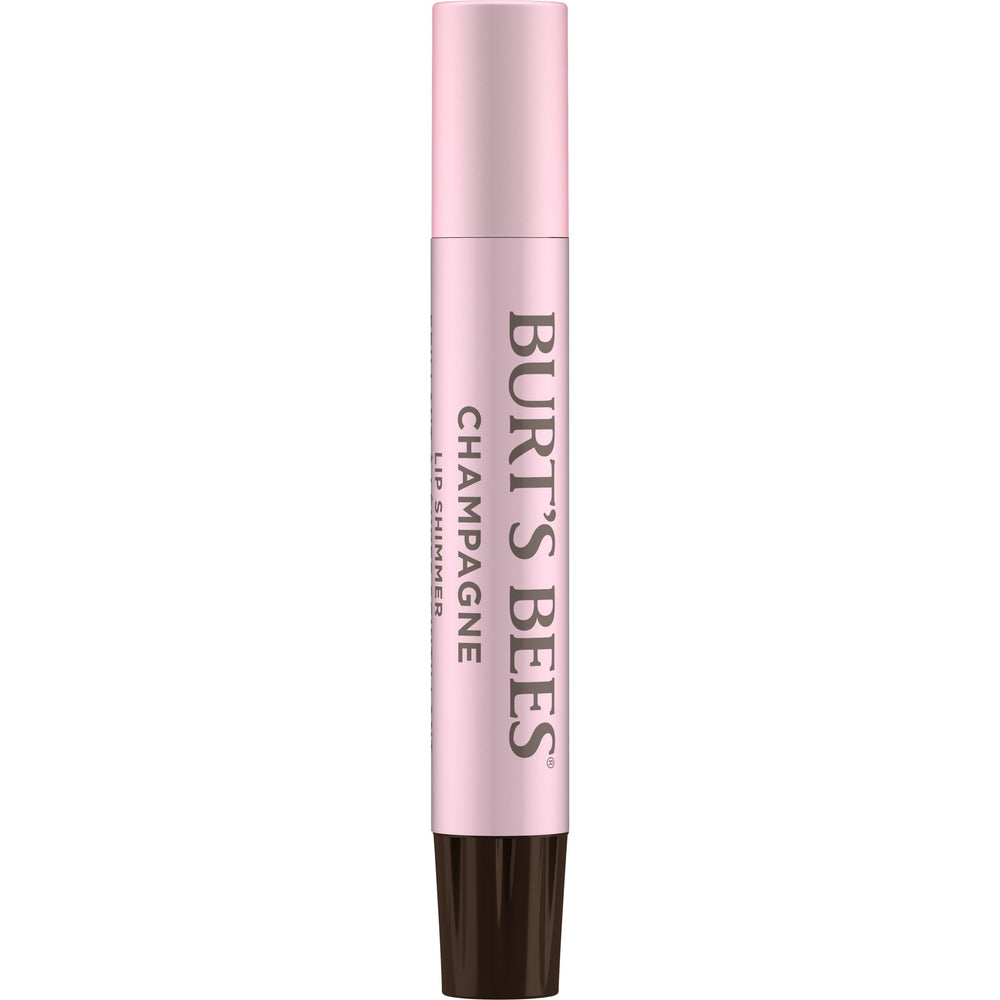 Burt's Bees Lip Shimmer Champagne wand highlights soft pink glow.