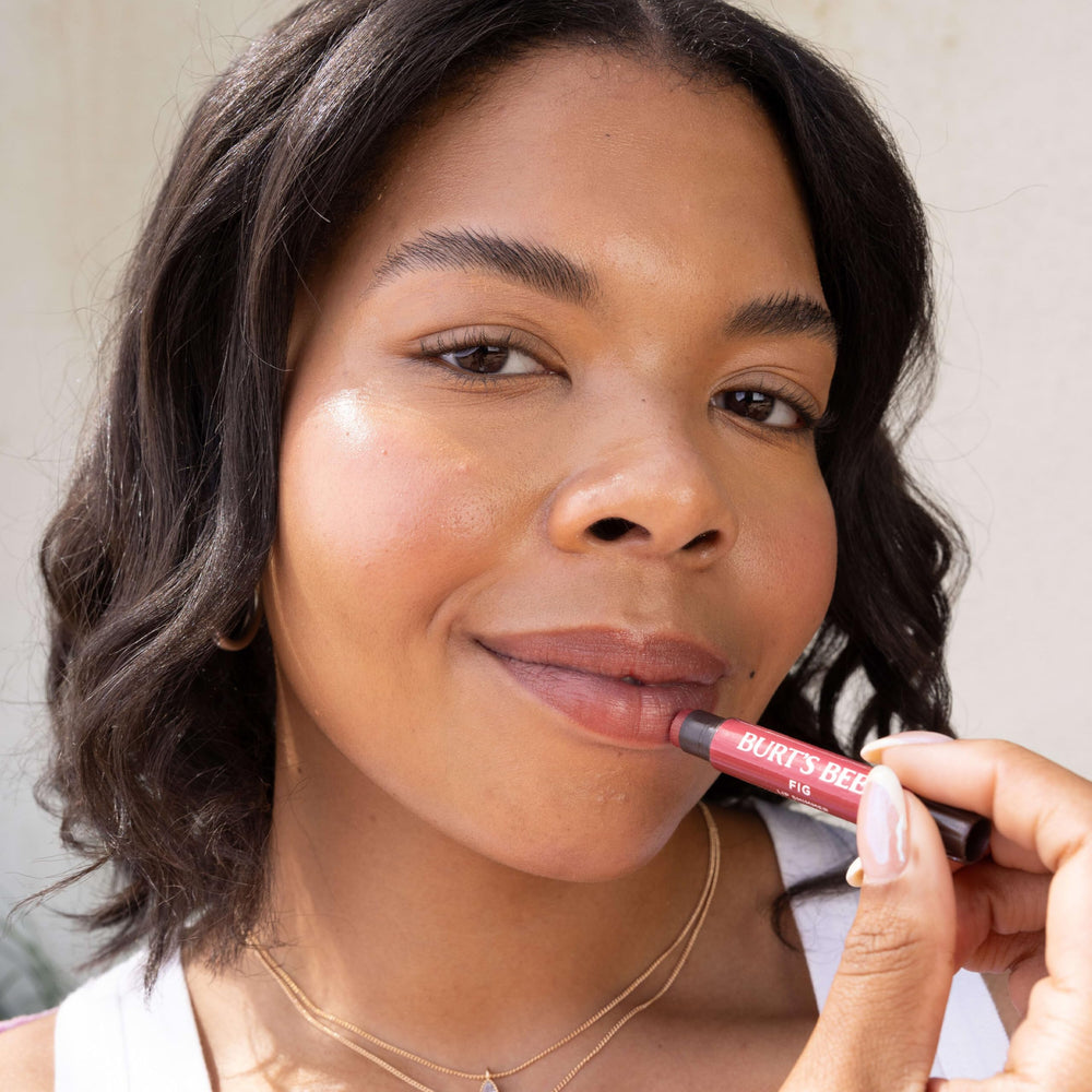 Burt's Bees Lip Shimmer Peony provides refreshing peppermint hint.