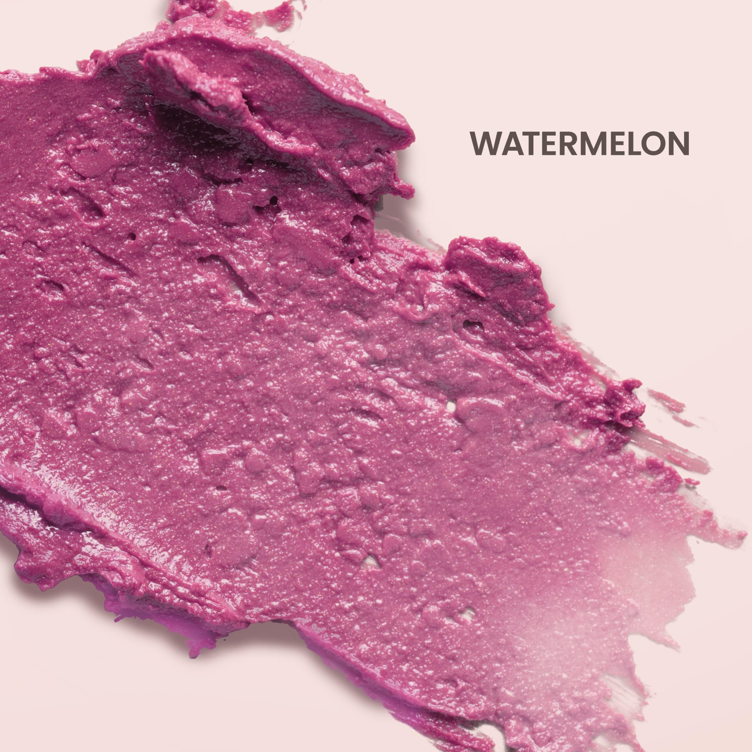 Lips wearing Burt's Bees Lip Shimmer Watermelon with a luminous watermelon glow.