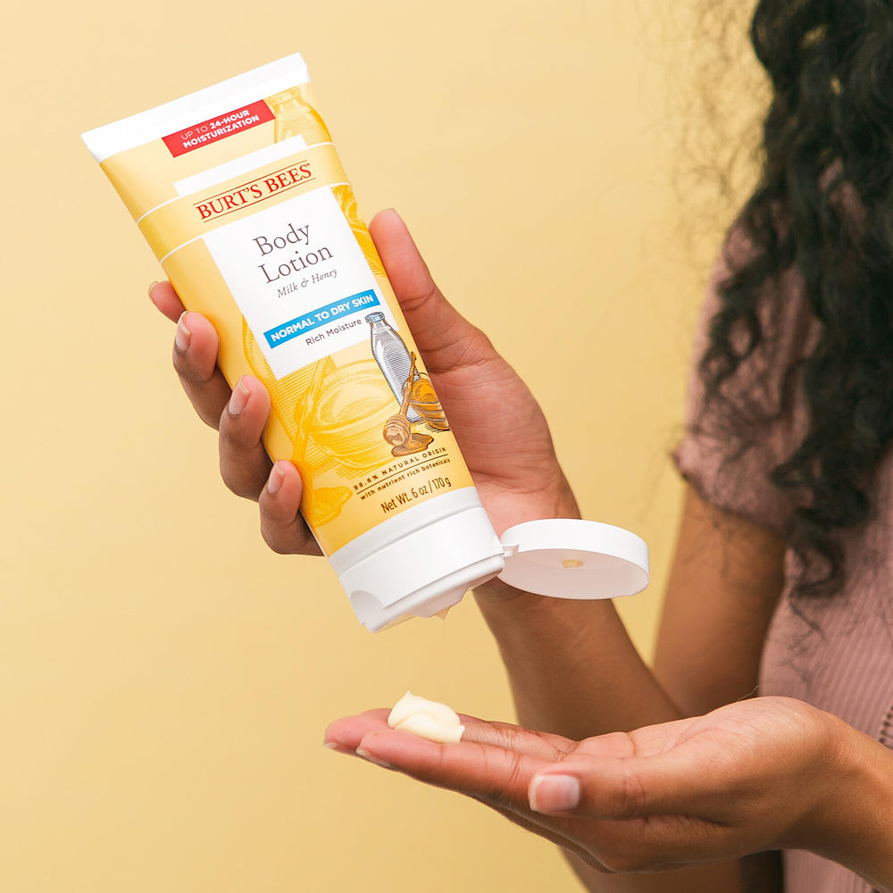 Burts Bees Milk & Honey Body Lotion applied to skin for quick absorption and softness