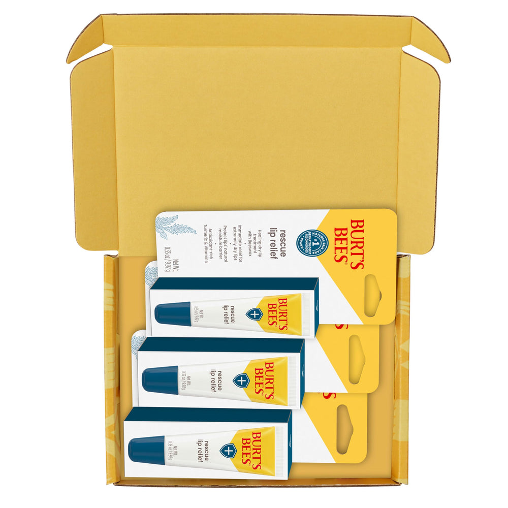 Burt's Bees Rescue Lip Relief etiqueta clara, ingredientes limpios.