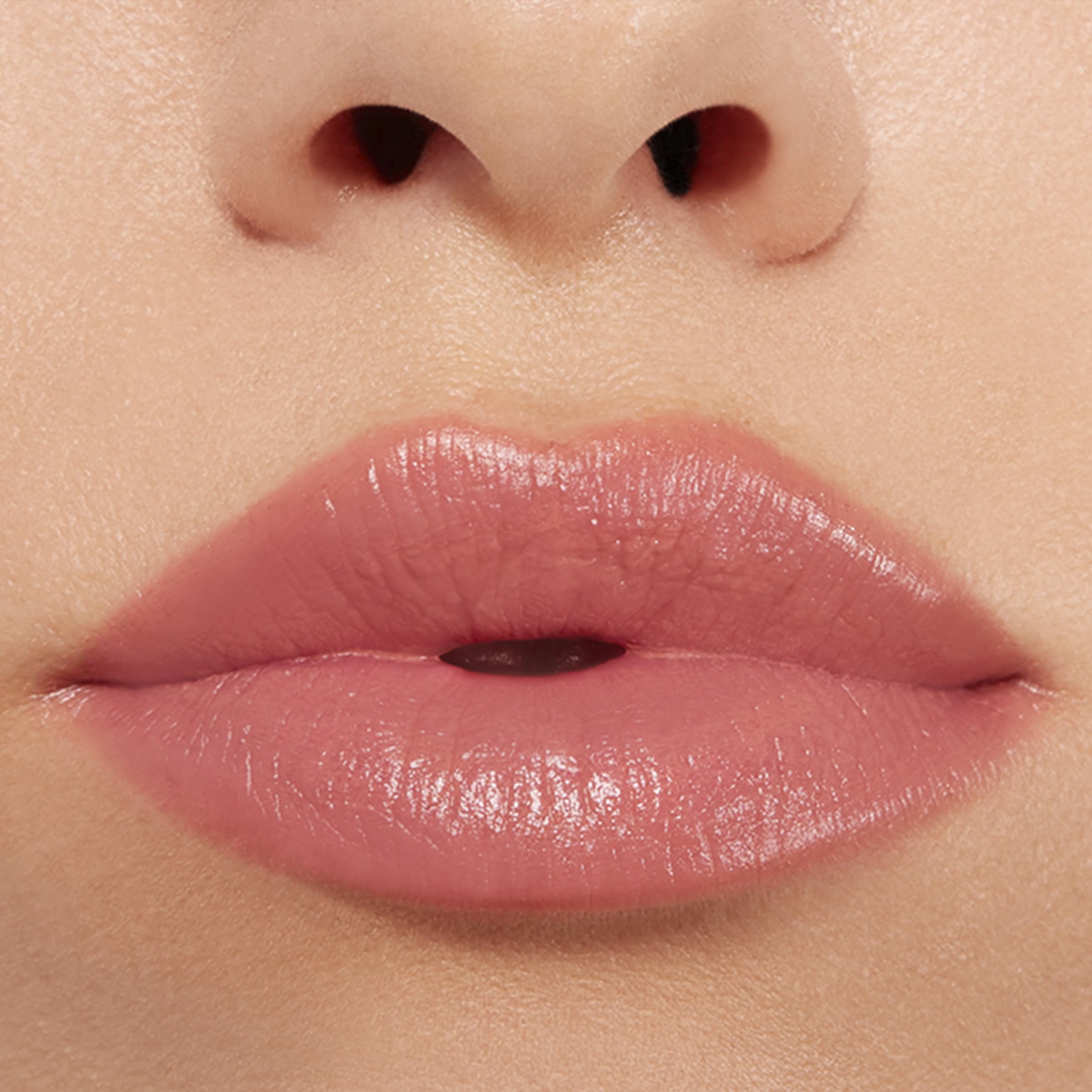 Buxom Power-Full Lip Balm application layer adds hydration and soft shine.