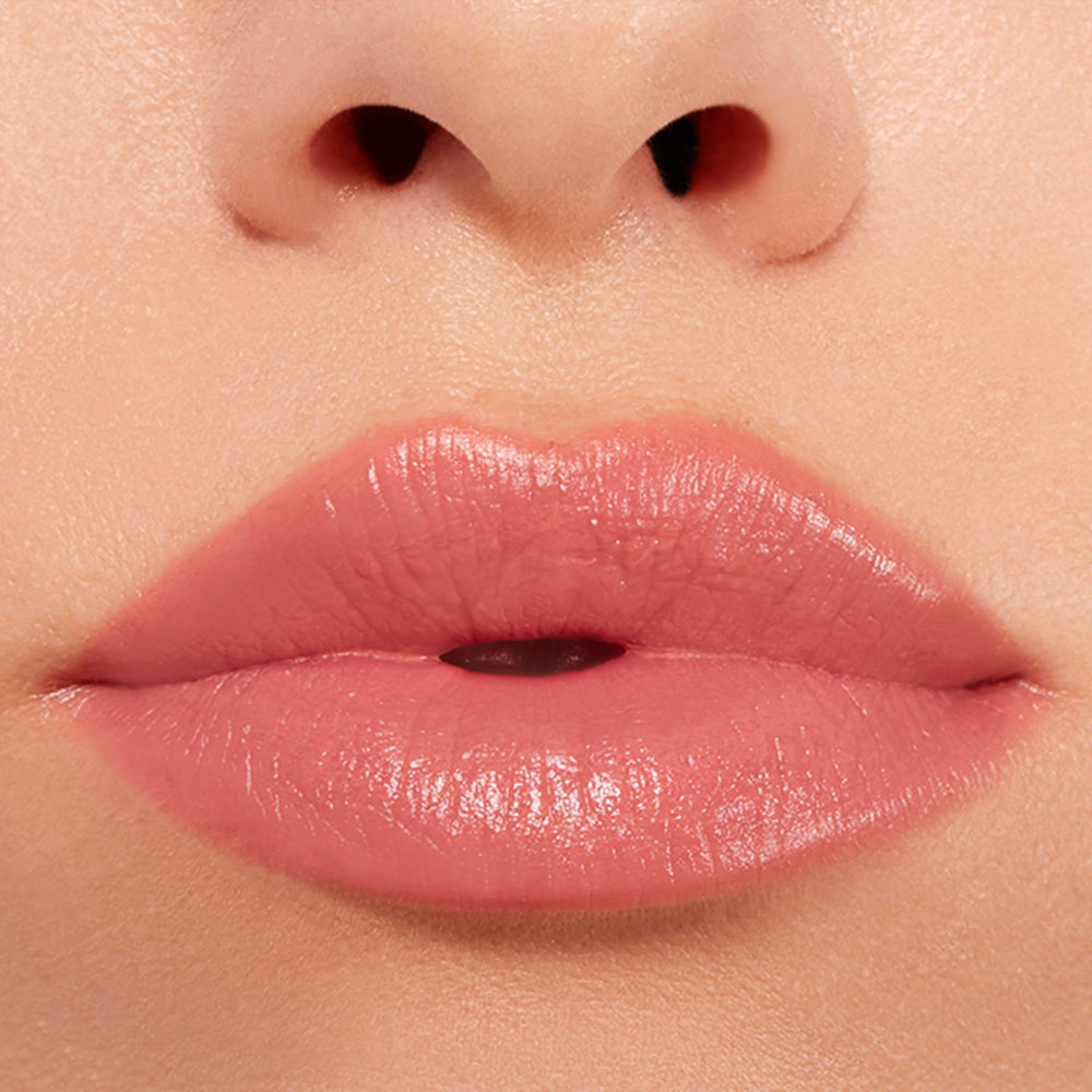 Buxom Power-Full Lip Balm application layer adds hydration and soft shine.