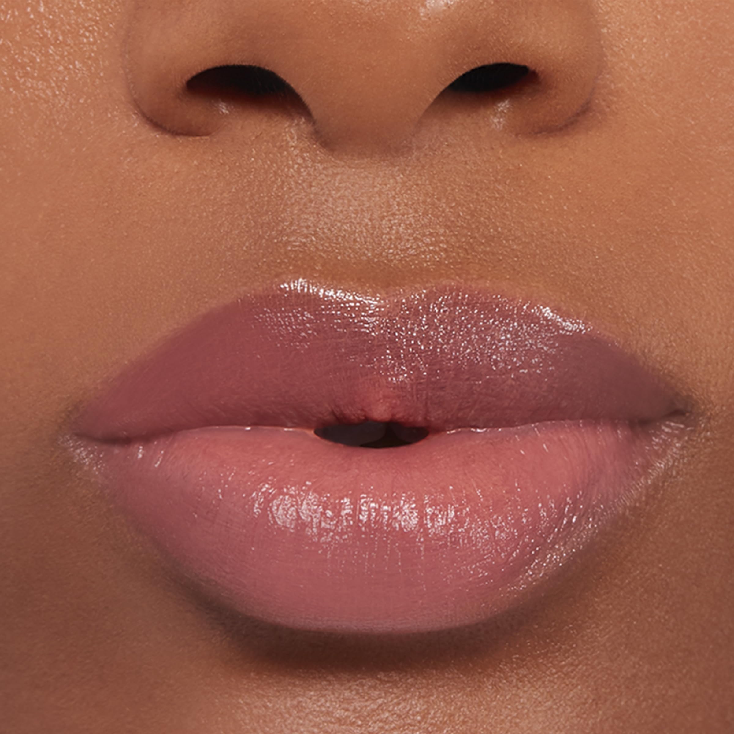 Buxom Power-Full Lip Balm gradual tint development on lips.
