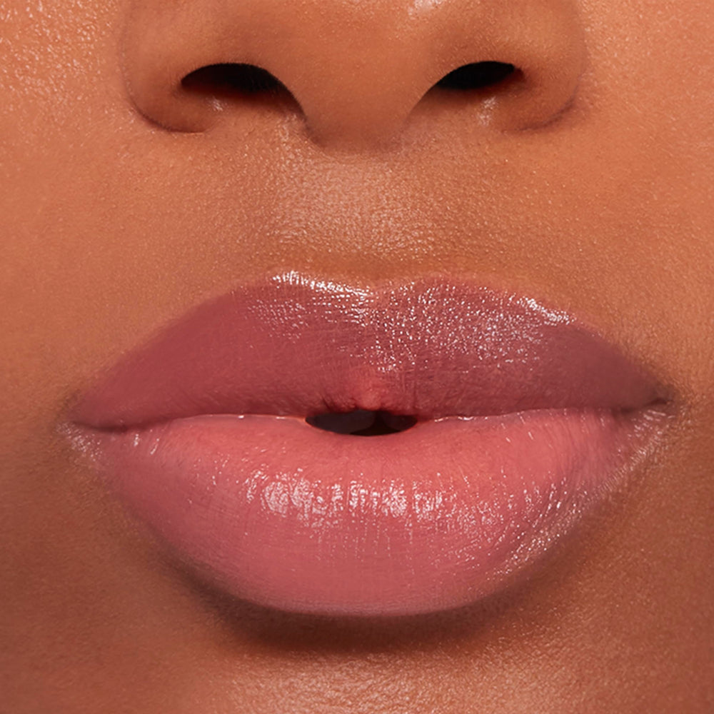 Buxom Power-Full Lip Balm gradual tint development on lips.