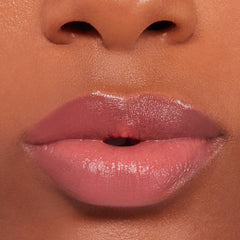 Buxom Power-Full Lip Balm gradual tint development on lips.