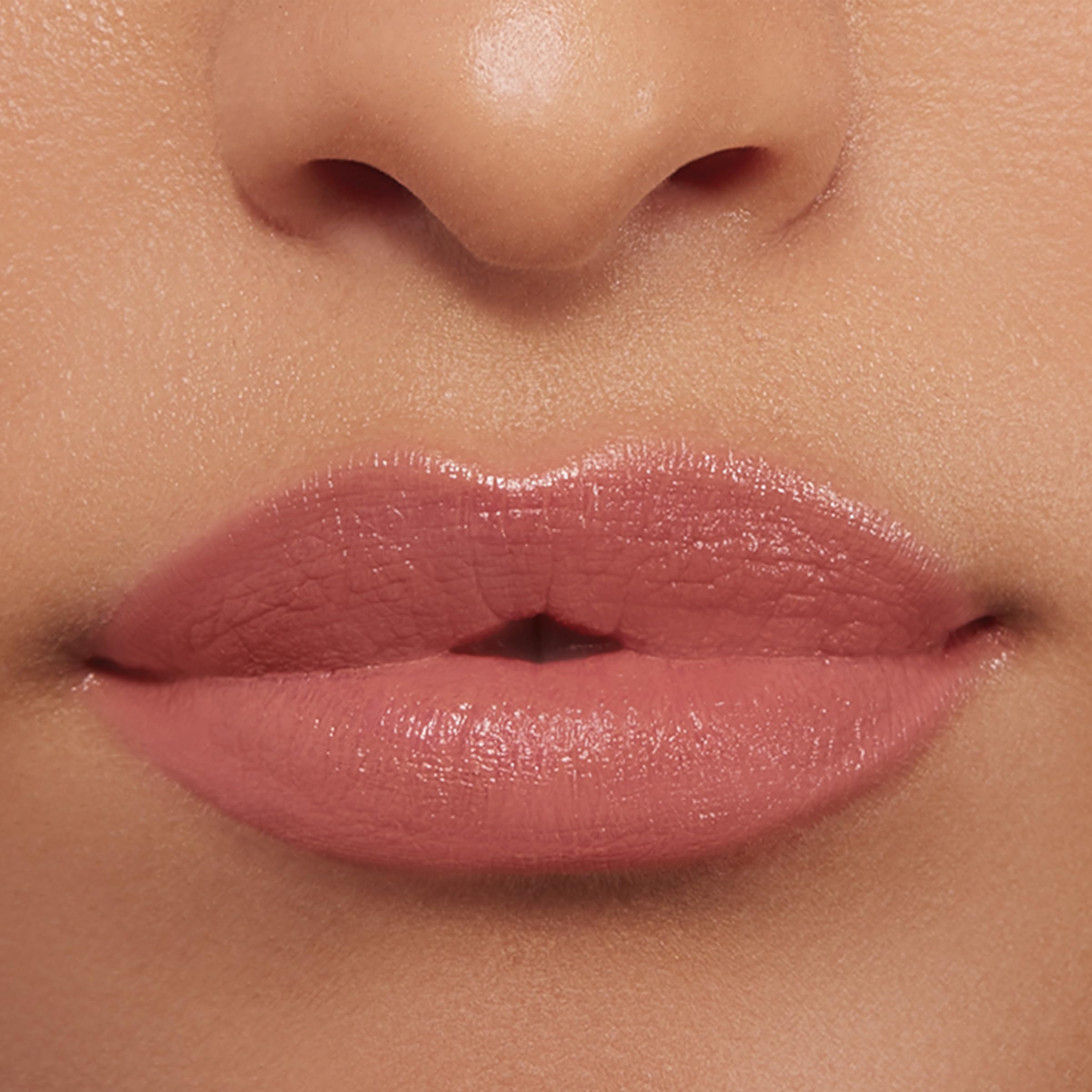 Buxom Power-Full Lip Balm packaging shown for on-the-go use.