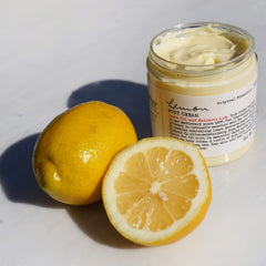 Lemon Body Cream features shea butter shown on display
