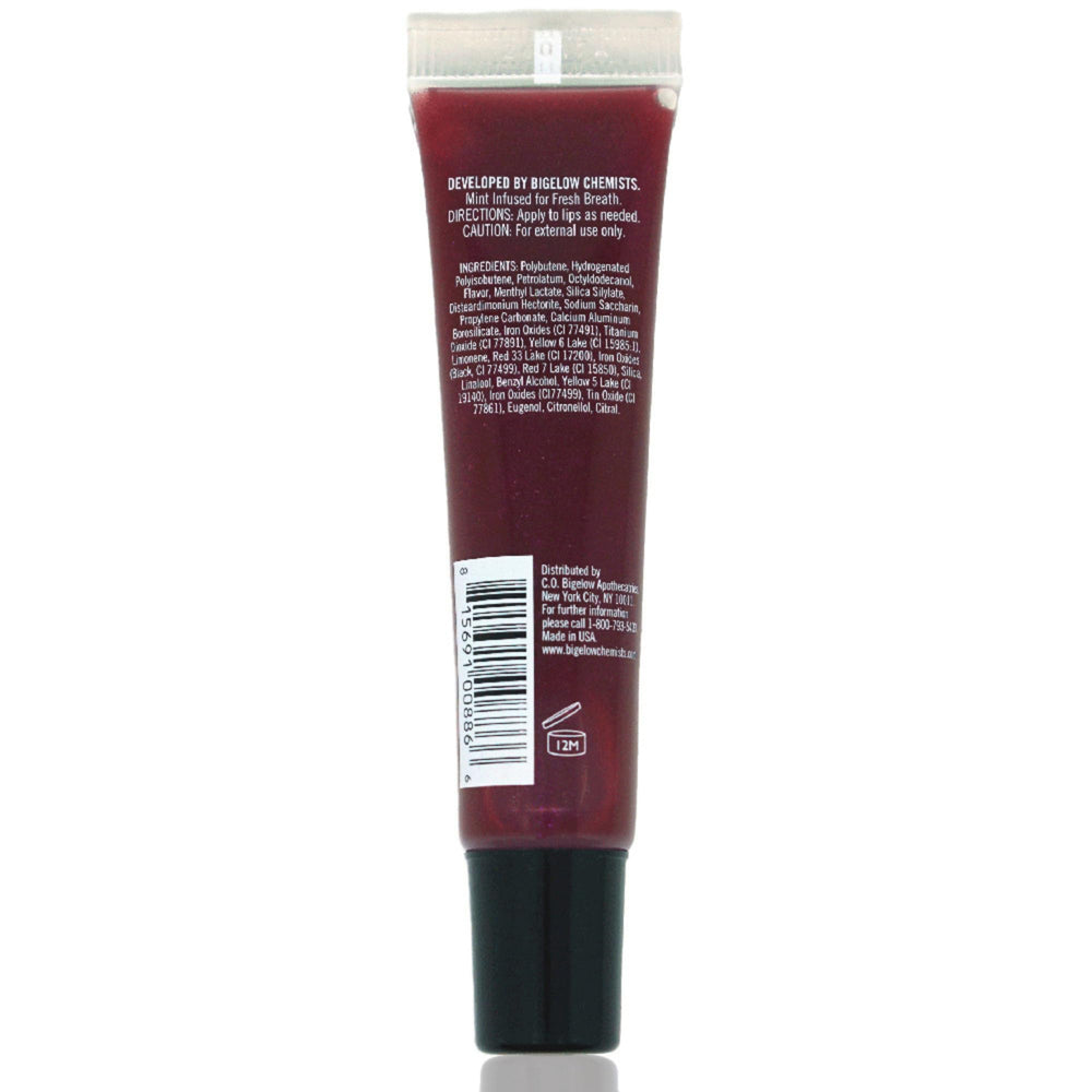 C.O. Bigelow Plum Mentha Lip Tint soft plum hue complements daily gloss looks.