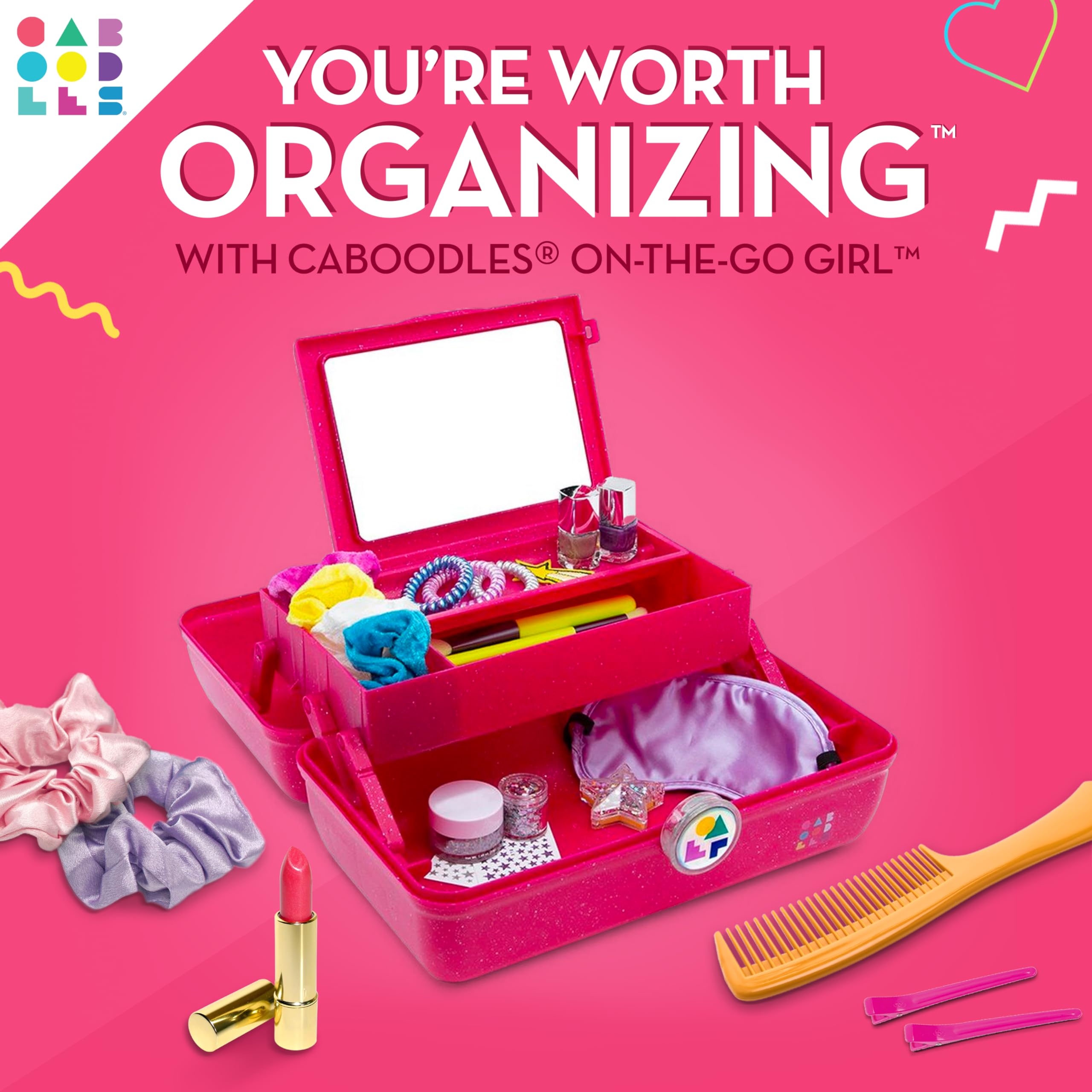 Caboodles On-The-Go Girl case showing spacious bottom storage for brushes and palettes.