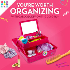 Caboodles On-The-Go Girl case showing spacious bottom storage for brushes and palettes.