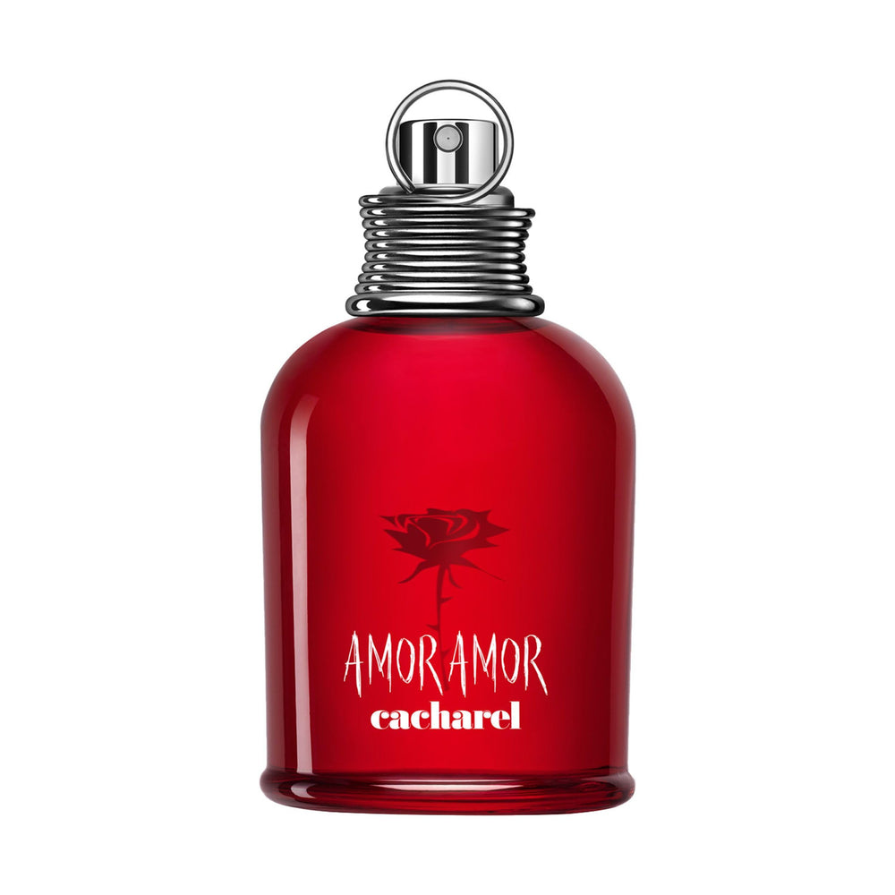 Cacharel Amor Amor bottle close-up showing the grenade design and pink tones for date-night allure.