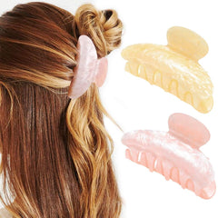 CAKURE acrylic claw clip pink closeup showing secure gentle hold