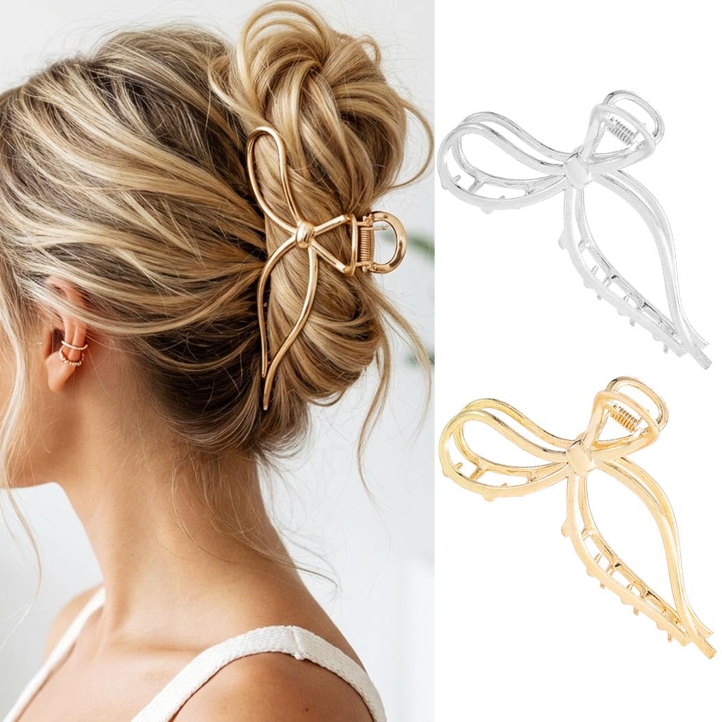 CAKURE bow claw clip in gold metal keeps hair secure and adds shine.