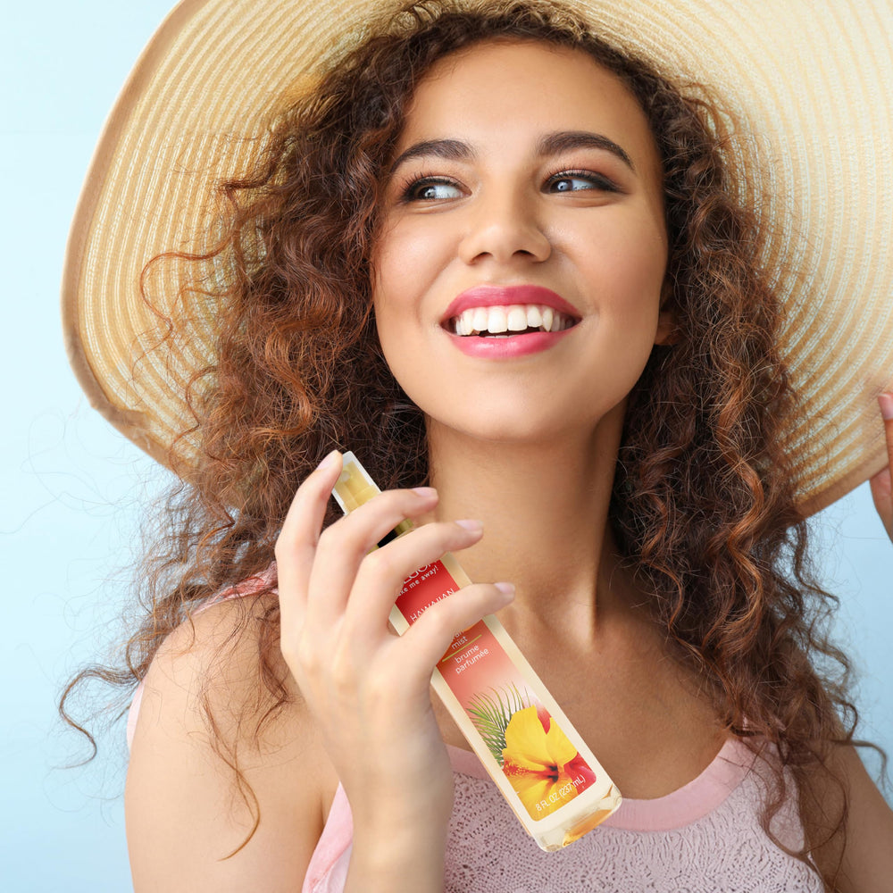 Calgon Hawaiian Ginger mist dispersed into air for ambient scent.