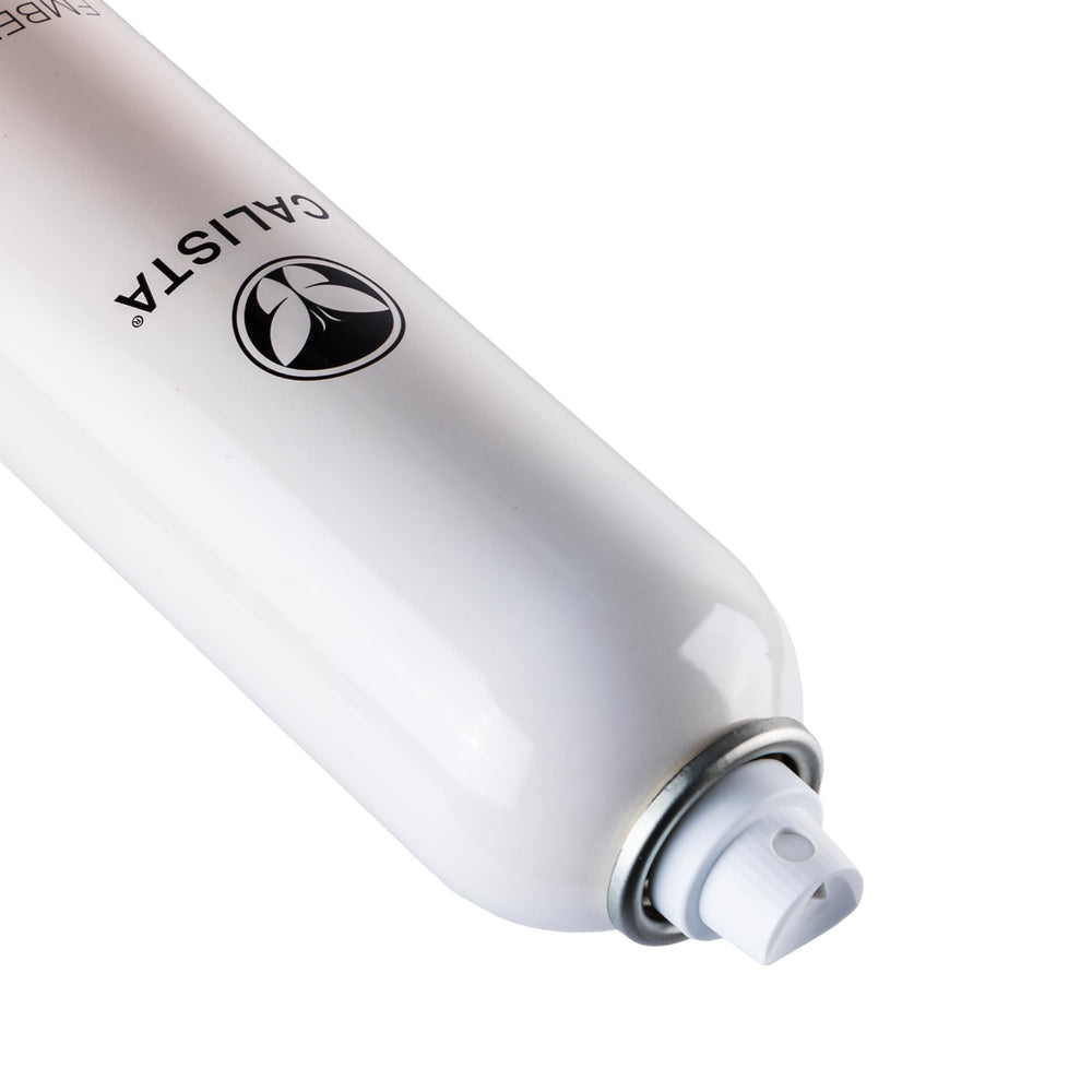 Calista Embellish Finishing Spray nozzle in action for even application and long-lasting control.